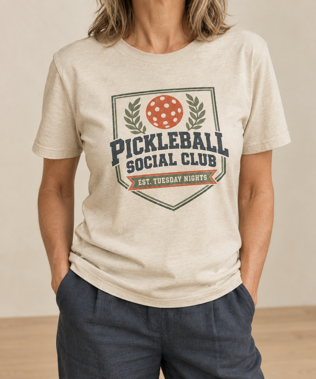 Natural cream t-shirt with a vintage Pickleball Social Club laurel crest badge